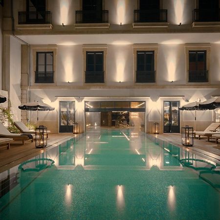 Ga Palace Hotel & Spa, A Xixth-Century Villa Porto Dış mekan fotoğraf The pool at the hotel