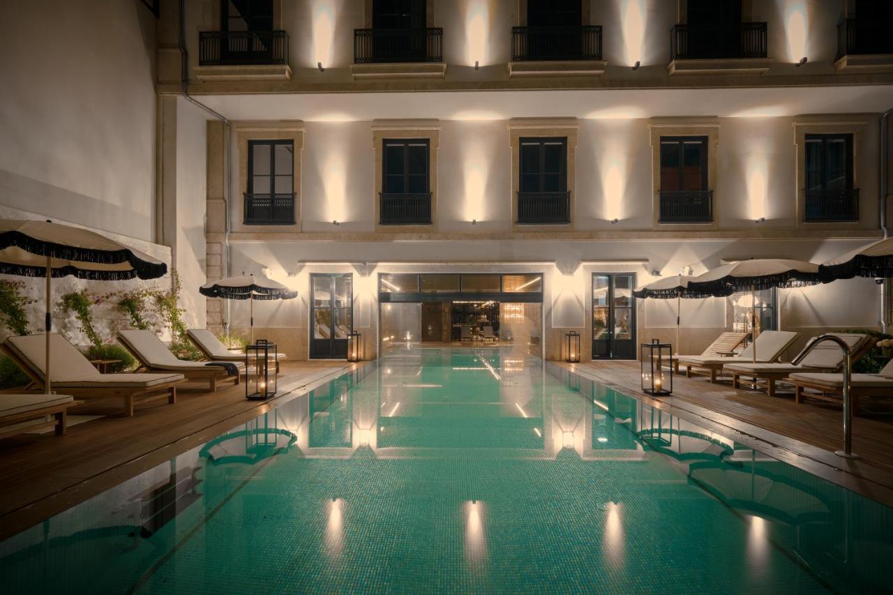 Ga Palace Hotel & Spa, A Xixth-Century Villa Porto Dış mekan fotoğraf The pool at the hotel